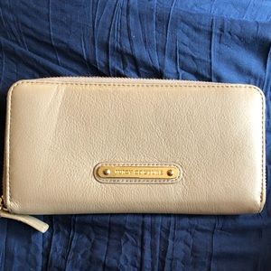Beautiful Tan Juicy Couture Zip Wallet.